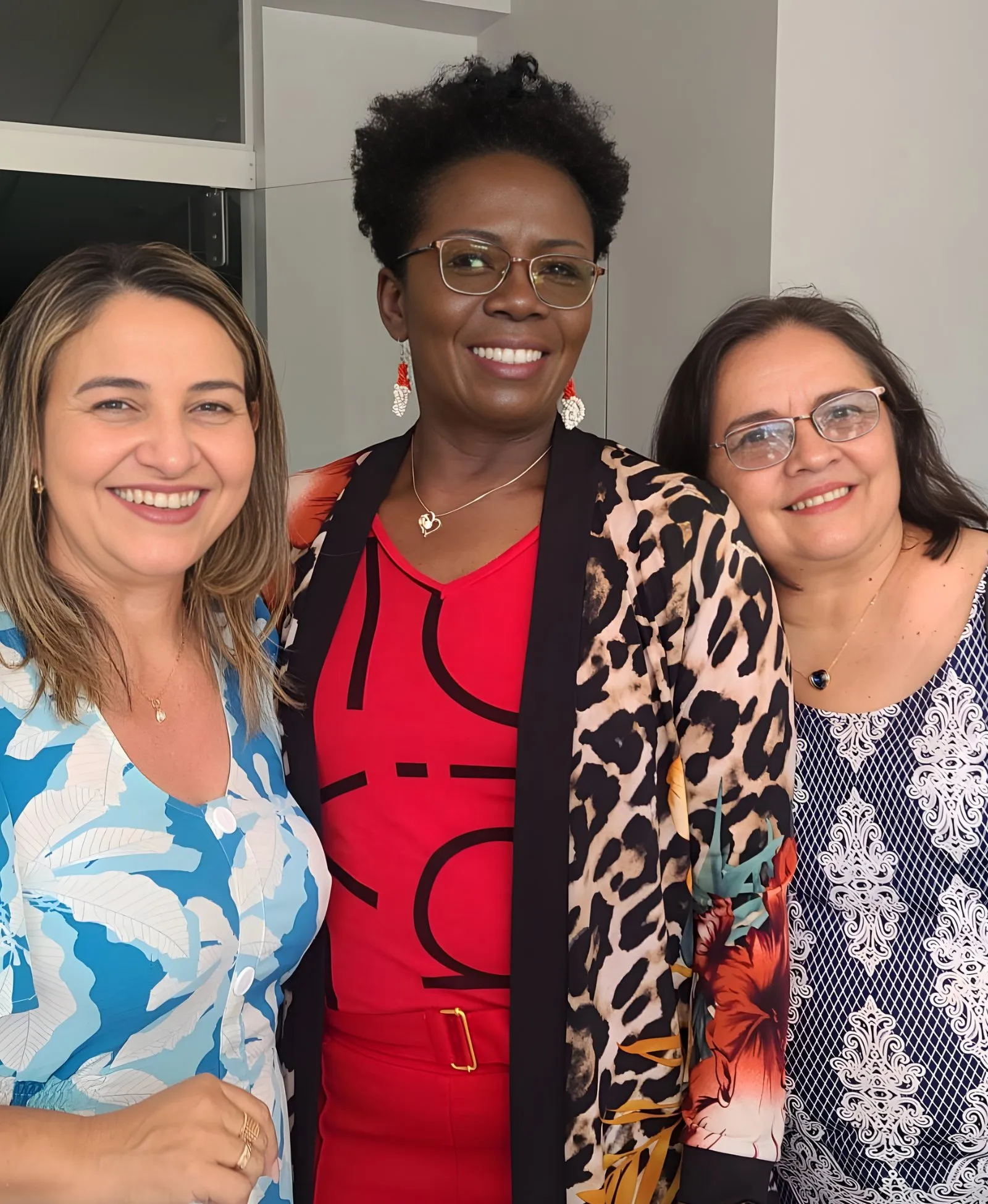 Pastor Astrid Soni with two women in Brazil
