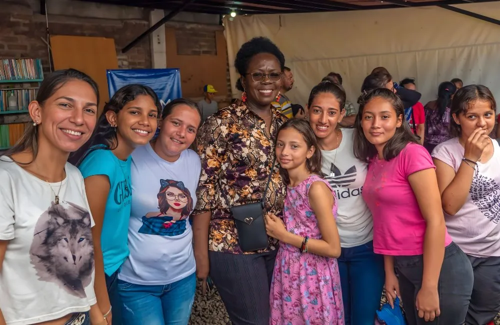 Pastor Astrid Soni with a group of women and girls in Colombia