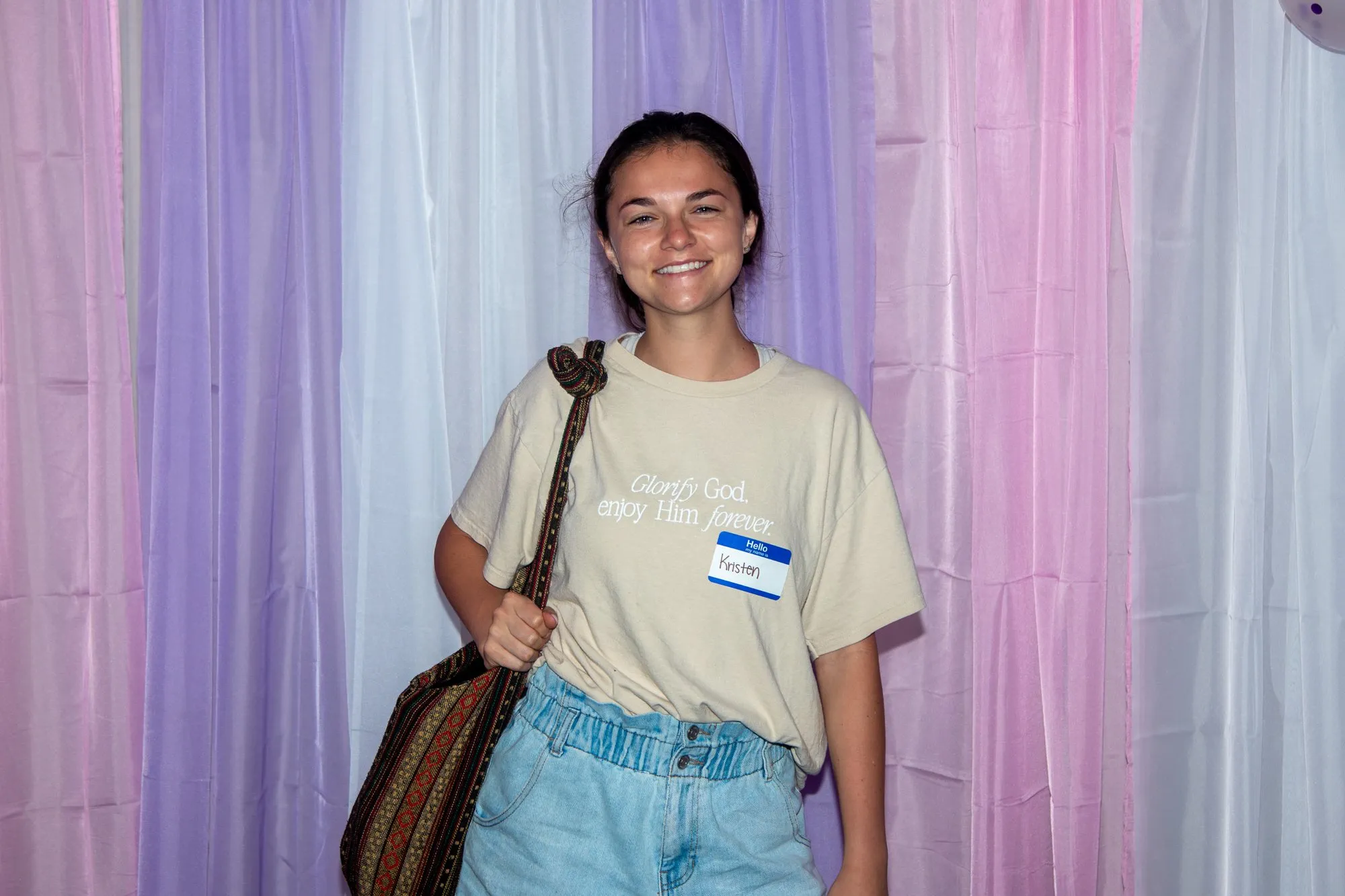 A young woman arriving at the conference