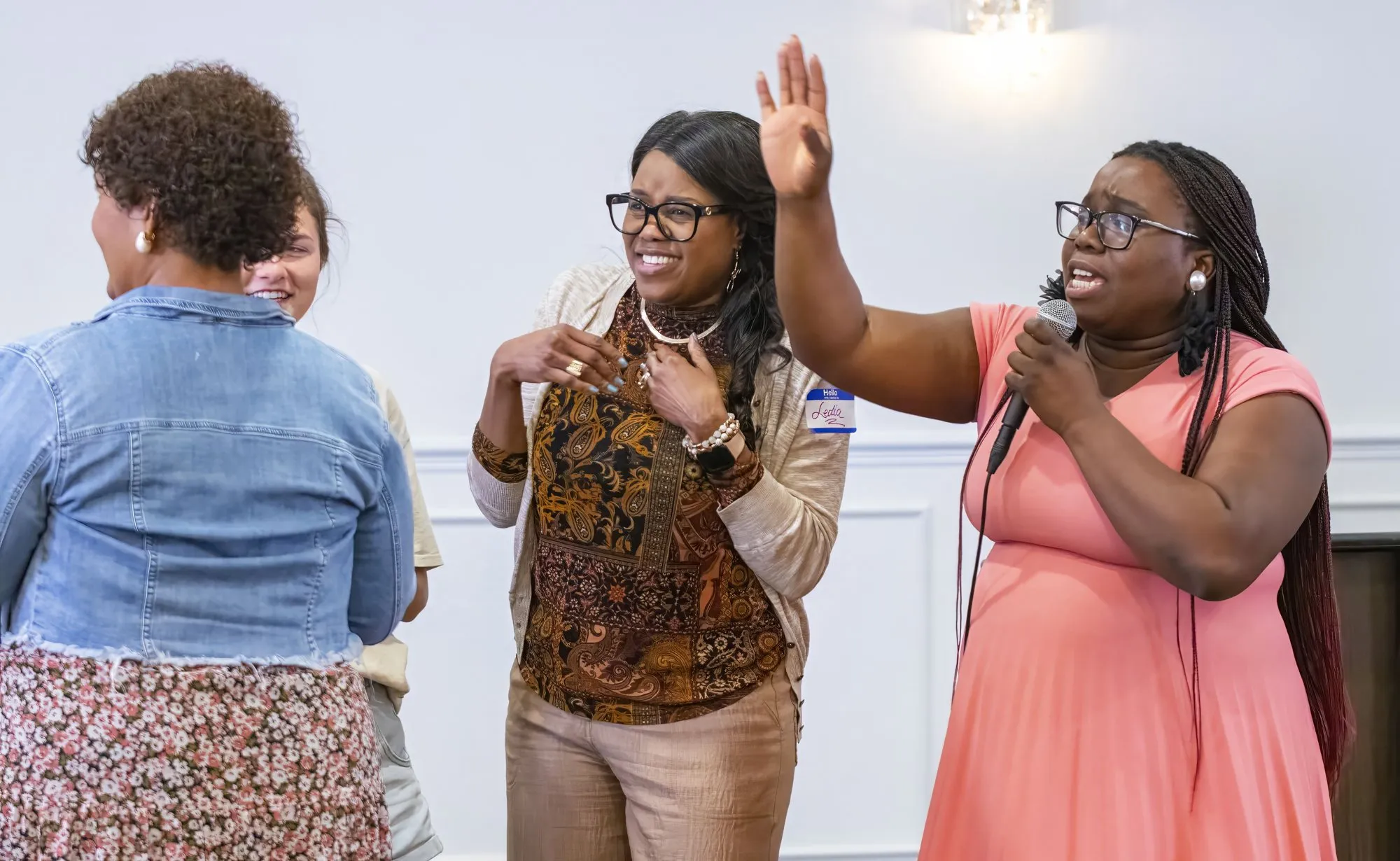 Women greeting each other during a break