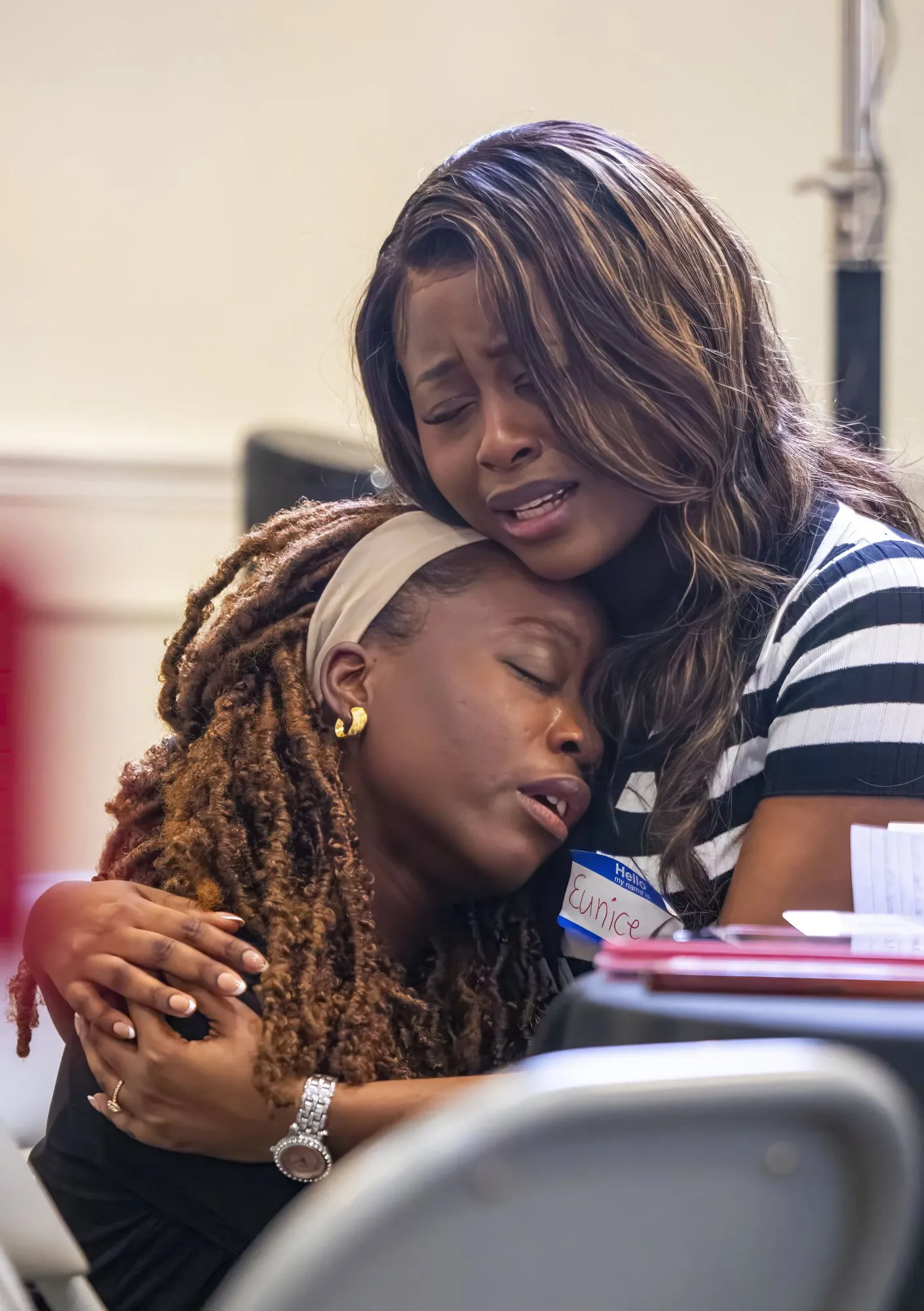 Two women in a long embrace