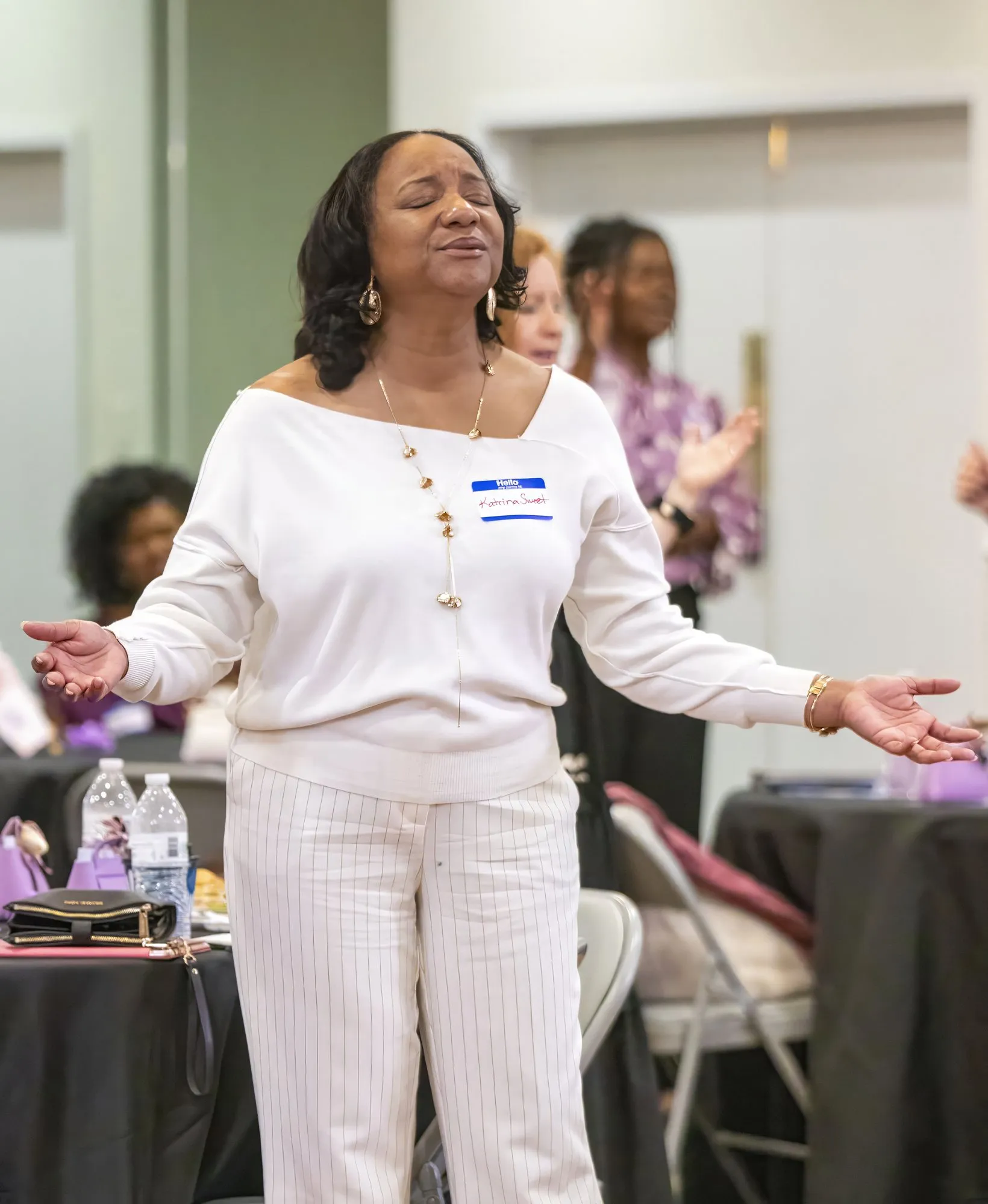 A speaker teaching the women gathered