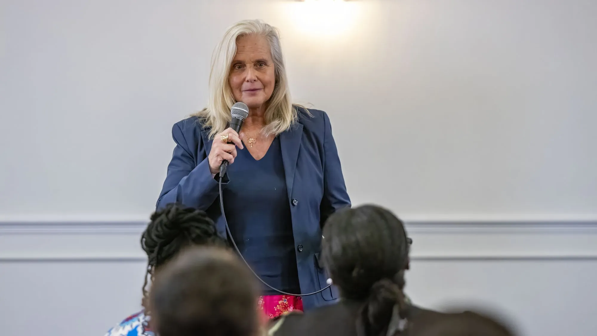 A speaker addressing the women
