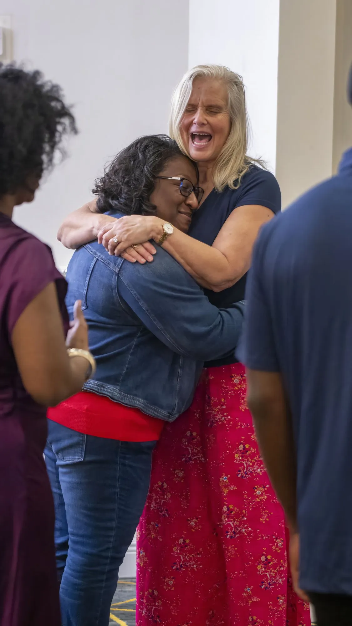 Two women greeting each other with joy