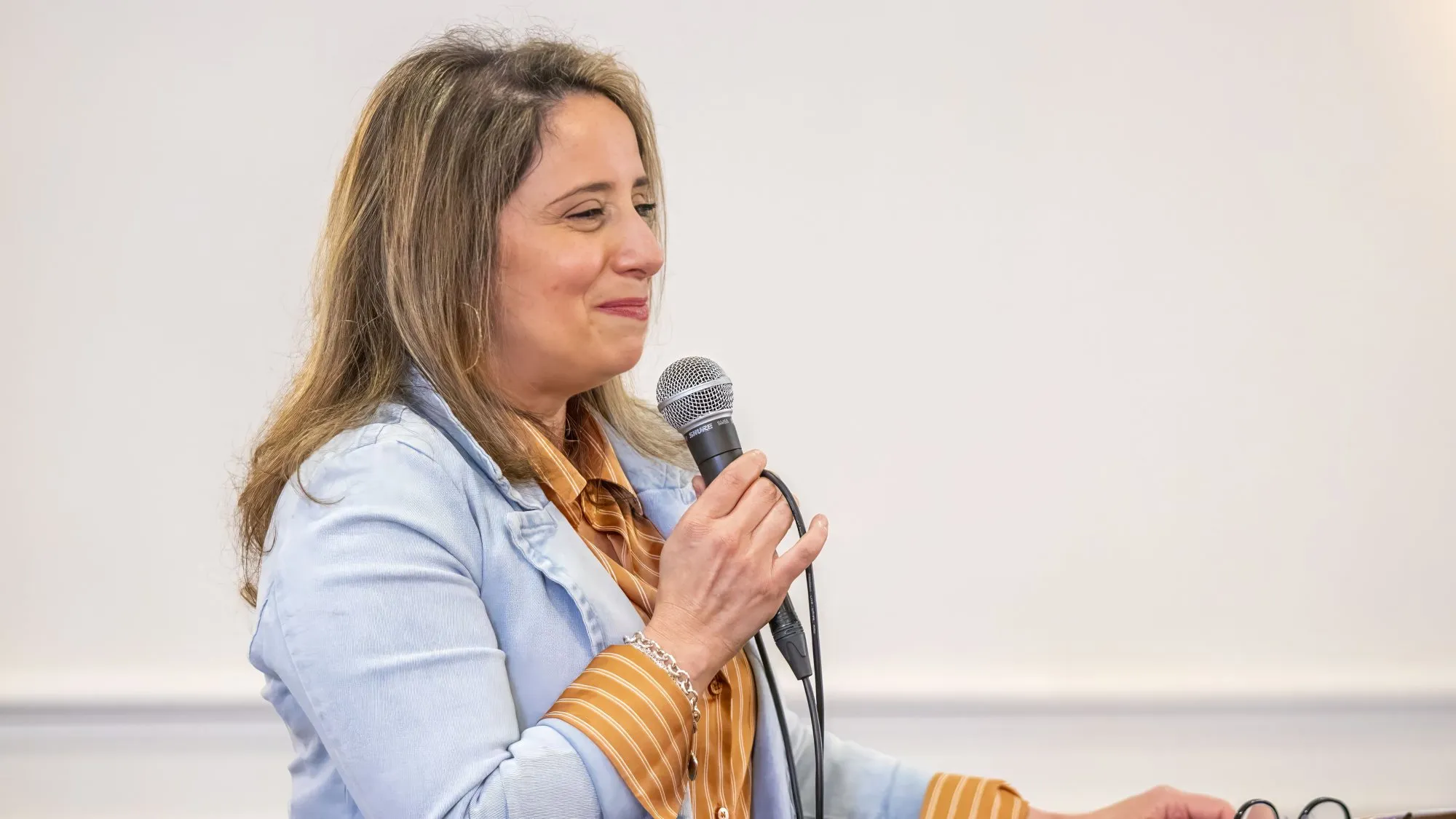 A speaker sharing at the microphone
